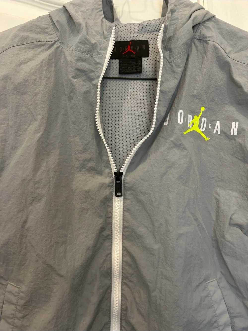 Jordan Gray and Black Hooded Windbreaker with Neon Accent